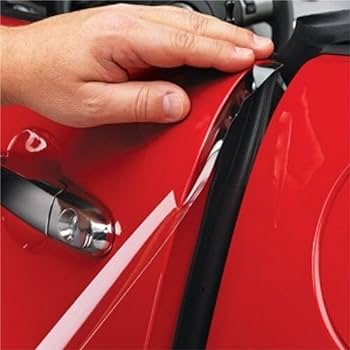 A hand is shown pressing against the seam where the red car door meets the body, near the black rubber trim—a key technique in Paint Protection Film Training.